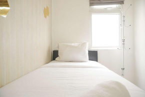 Modern and Classic 2BR at Green Pramuka City Apartment By Travelio